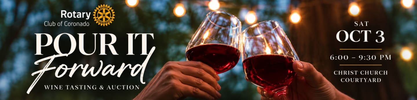 Two hands clink wine glasses filled with red wine in the foreground, with text and string lights in the blurred background.