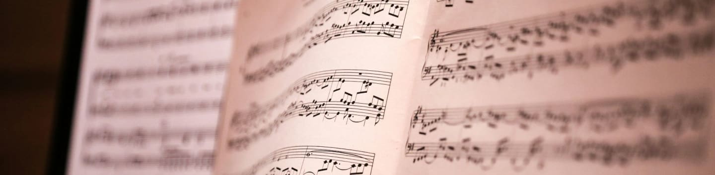 musical notes on brown wooden table