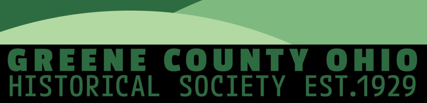 Green rolling hills form the background above the black foreground text "GREENE COUNTY OHIO HISTORICAL SOCIETY EST.1929".