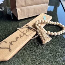 Snackuterie board and toy item