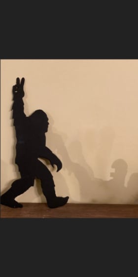 Item #27: Hand-cut Metal Art: Big Foot Peace item