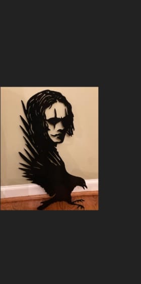 Item #29: Hand-cut Metal Art: Joker item