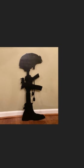 Item #25: Hand-cut Metal Art: Military item