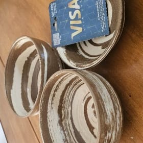 3 pottery Bowls and a $25 Visa Gift Card item