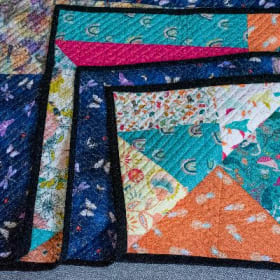 8. Playful Handcrafted Quilt item