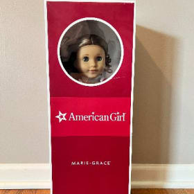 Exclusive *Retired* American Girl Doll + Book item