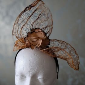 84. Handmade Fascinator - Elegance in Every Stitch item