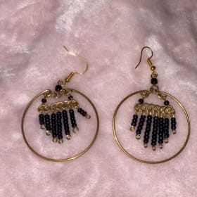Brass and black bead earring item
