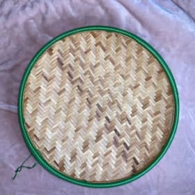 Hand woven shallow platter / basket item