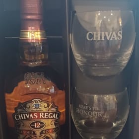 Chivas Regal 12 Year Old bottle with two glasses item