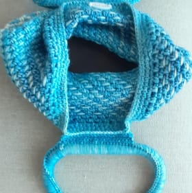 Hand-crocheted hand bag item