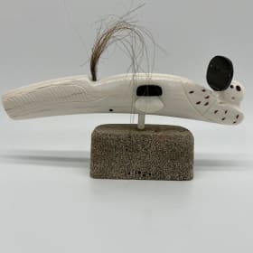 #45 Ivory tusk with ulu and baleen pegs item