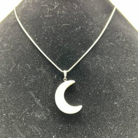 #19 Crescent Moon Ivory Pendant with Sterling Silver Chain item