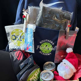 22. "Everything Pickleball but the Paddle" basket item