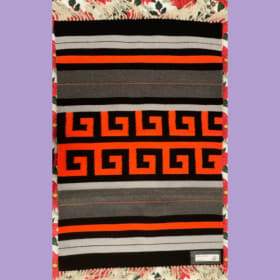 Hand Woven Artisan Rug - Orange, Black, & Gray item
