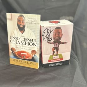 Damario Davis Autographed Book and Bobblehead item