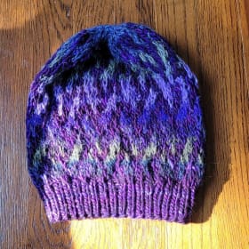 Purple Knitted Hat with Blue Accents item