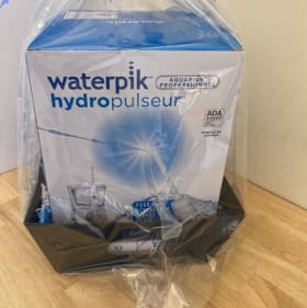 76 - Great Smiles Waterpik basket item