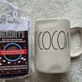 $25 Starbucks gift card, hot chocolate bomb, and mug. item