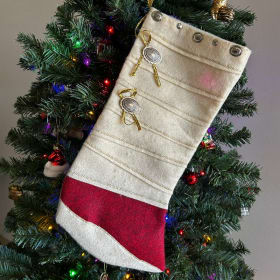 concho-pin adorned moccasin felt Christmas stocking item
