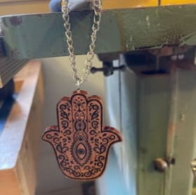 Mezuzah and Hamsa by Joel Troster item