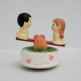 1974 Revolving Seesaw Musical Figurine item