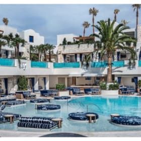 Main Level Couch with umbrella and table 4 item