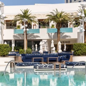 Main Level Couch with umbrella and table 9 item