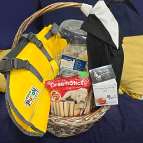 Dog Basket with Life Jacket and Other Doggie Treats item