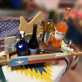 S-54 Wheelbarrow Holding Spirits and Wines of Texas item
