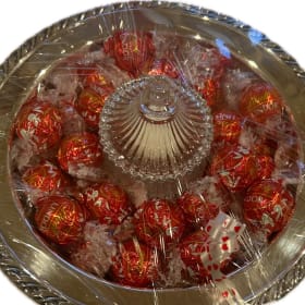 Silver candy dish with chocolate truffles item