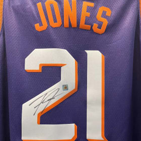 Autographed Tyus Jones # 21 Jersey item