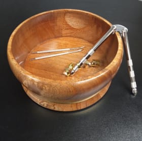 Handcrafted redwood turned nut bowl with tools and nuts item
