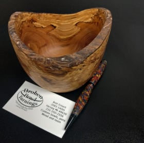 Handcrafted live edge bowl with custom turned pen item