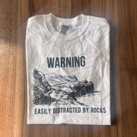 'WARNING Easily Distracted by Rocks' T-Shirt (Size M) item