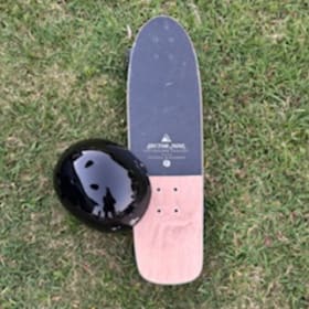 Sector 9 skateboard and helmet- Backdoor Surf Hanalei item