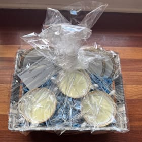 57. Candle and China Basket item