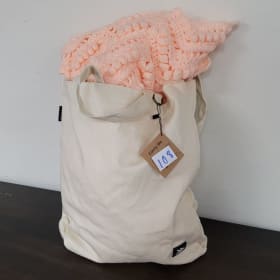 #108 Threads travel bag and hand crocheted baby blanket item