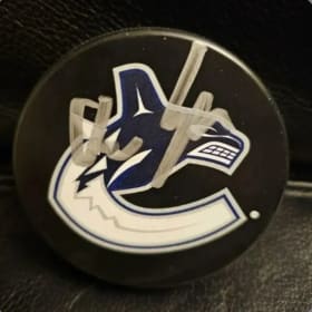 Signed Puck by Quinn Hughes and Canucks Scarf item