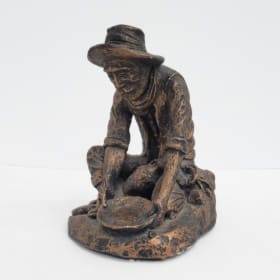 Metal Panning for Gold Sculpture item