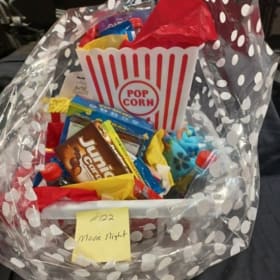 Lot #122 Movie Night! Clarinet Section Basket Value $ 75 item