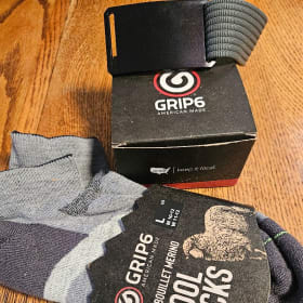50. One Grip6 belt and pair of smart wool socks item
