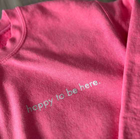 'happy to be here' crew sweater item