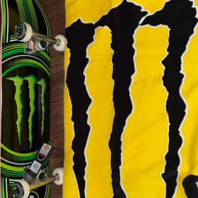 Monster Energy skateboard and Towel item