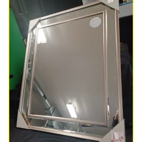 Lot #154 Luxe Silver Mirror Donated By: Alice Gray Value $99 item