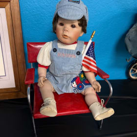 Vintage barber chair and doll item