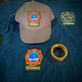 Shirt, hat, shoulder patch, hockey puck, fire pole item