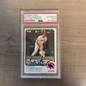 Signed Brooks Robinson Card (1973) item