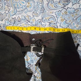 Lightly Used Leather Chaps with Fringe Sides item