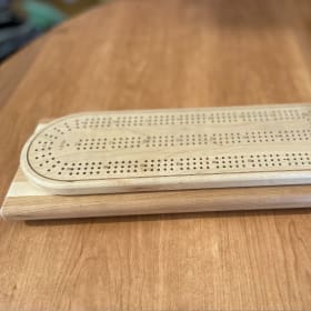 7. Handcrafted Maple Crib Board item